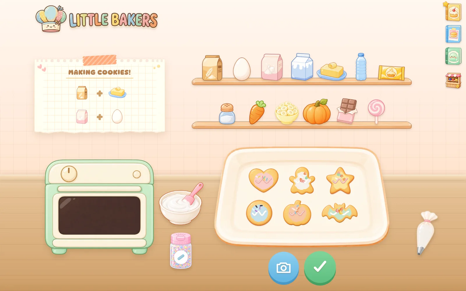 A tray of decorated heart, ghost, star, round, pumpkin and bat cookies.
